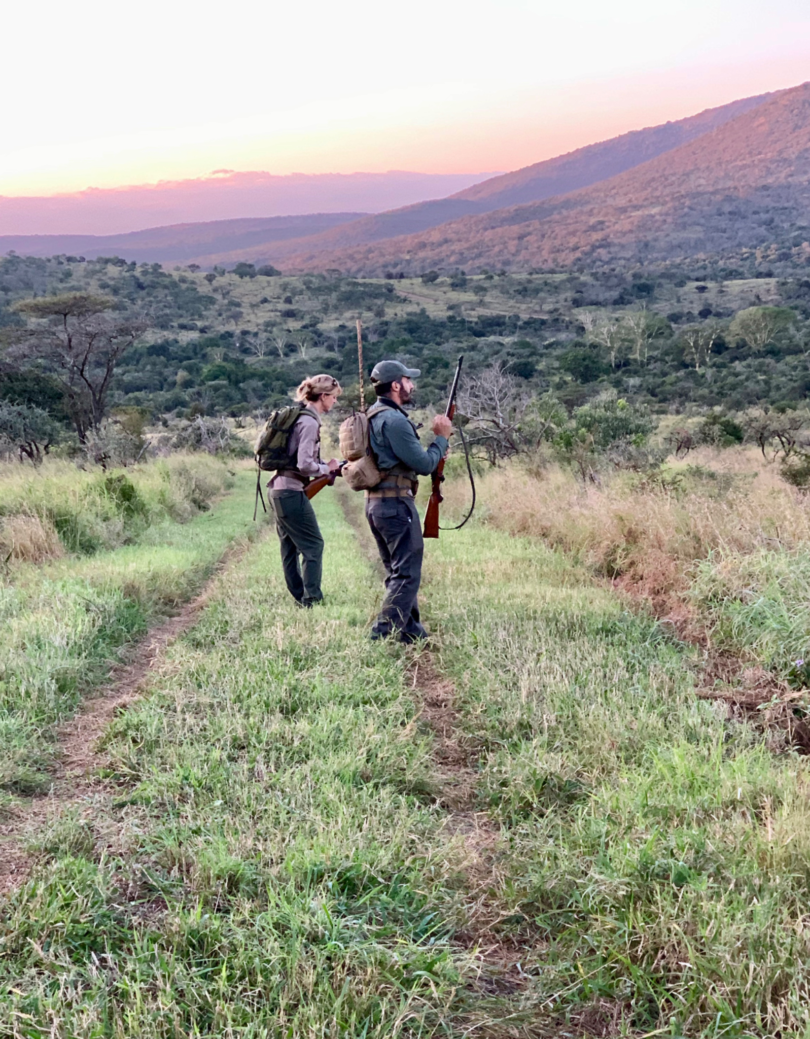 Massi and other guide checking their guns